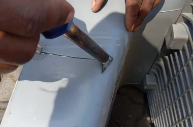 plastic trolley repairs by plastic welding cracked sections together again Trolley clinic technition plastic welding a trolley back together